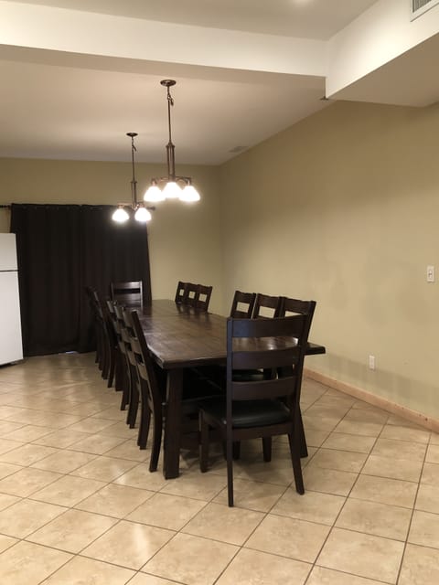 Kitchen table with 14 chairs.