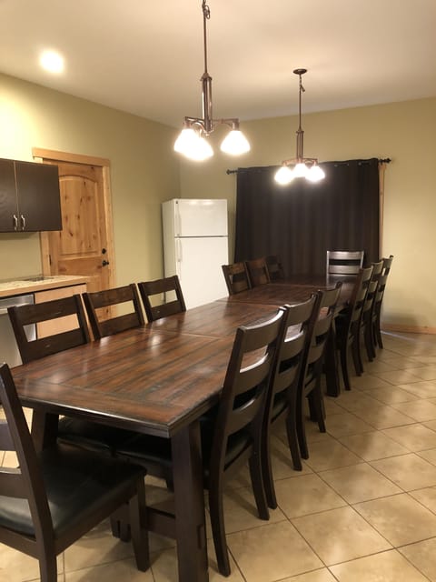 Kitchen table with 14 chairs.