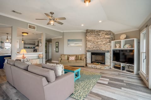 living room with sleeper sofa and TV