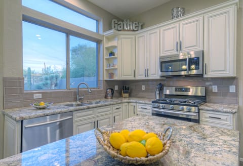 Kitchen will delight the chef and helpers although tempting window view may prove to be a distraction.