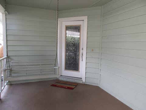 Front door with porch swing