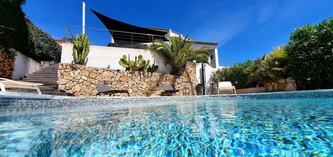 Pool and villa in the back