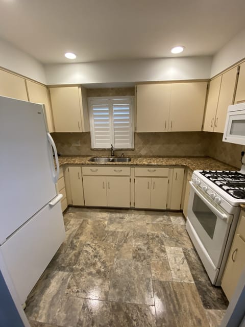 First master has kitchenette-full size fridge, stove, microwave and coffee maker