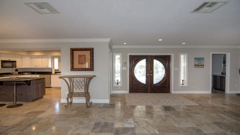 View toward front door and kitchen to the left. 