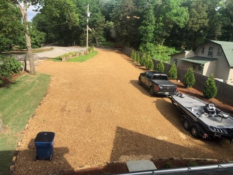 PLENTY OF PARKING! View of driveway from upstairs