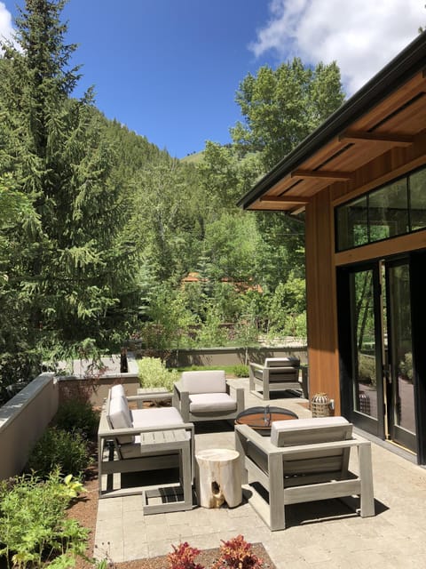 On the patio in Spring. You can hear the river running below the ridge.