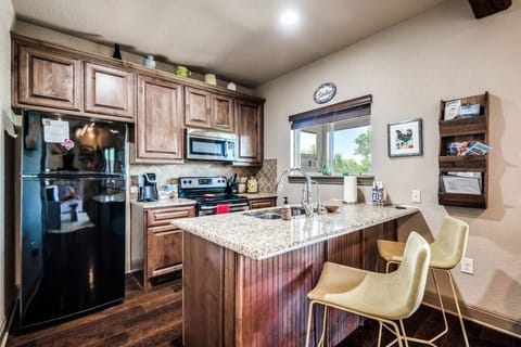 Well Stocked Kitchen with Bar Dining
