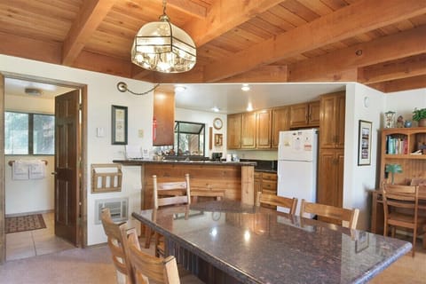 Granite Dining Room Table and Bar Stools for Extra Seating