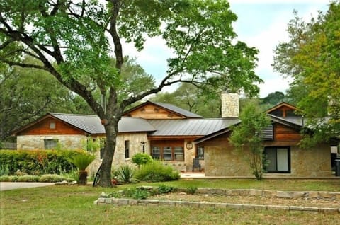 Surrounded by large oaks - Rustic Sprawling 3400 sq ft residence.