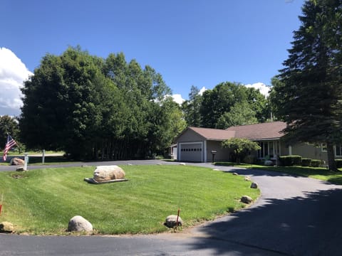 Front of house, circle drive, 2-car garage. Room for trailer, boat, RV.