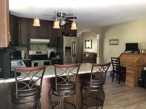 Kitchen, stainless steel appliances, dishwasher, disposal, coffee maker, tv