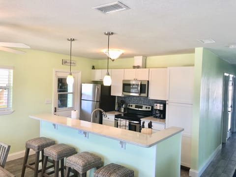  Fully stocked kitchen with new appliances and house wares.