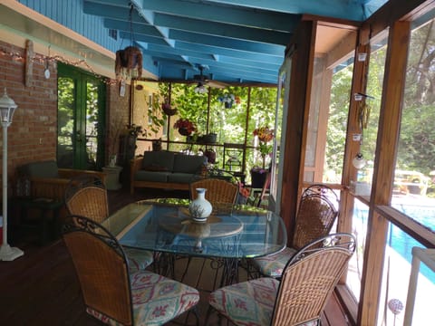 Dine on the glass table on your back porch or relax in comfy sofa chairs.
