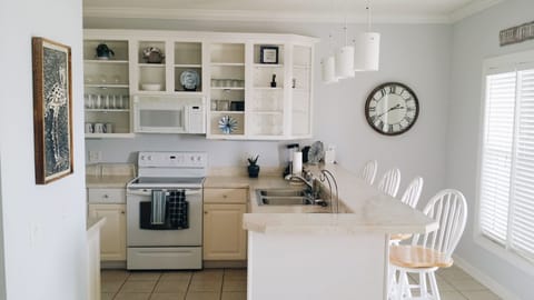 Kitchen Area with island and bar stools