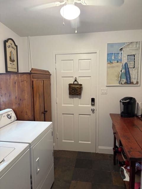 Washer dryer off kitchen