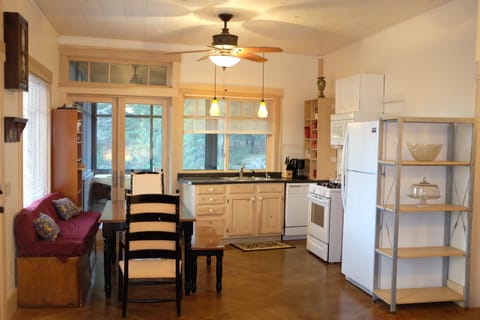 Downstairs dining, kitchen area. Additional larger one upstairs as well