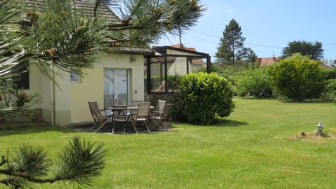 Large 2000m2 enclosed garden surrounds the house.