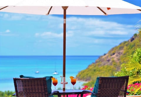 A perfect spot for two overlooking the Caribbean Sea.