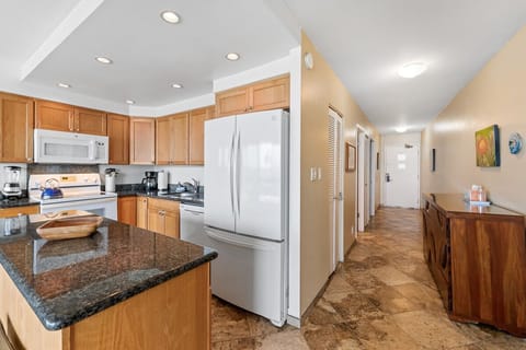 Looking down hall to entrance door.