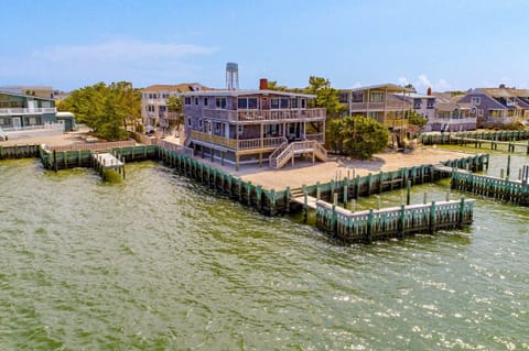 House surrounded by Bay on two sides with dock
