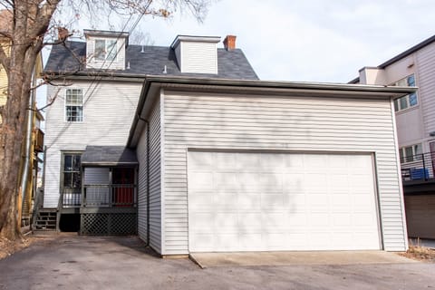 view of garage and parking pad