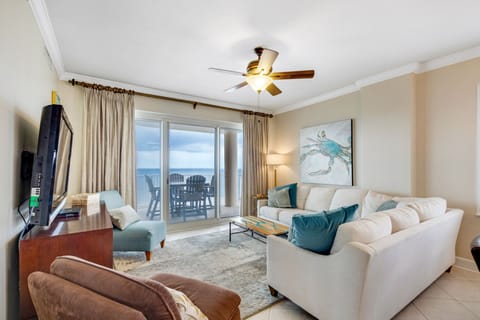 Living room with balcony access.