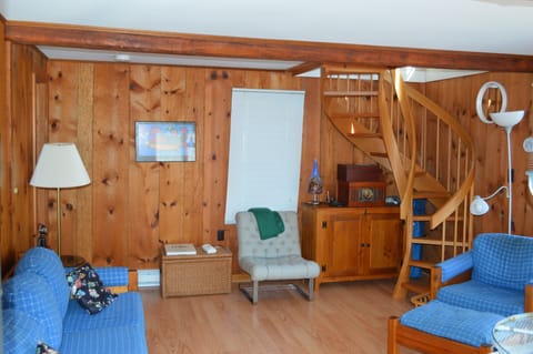 Spiral staircase to the spacious mater bedroom and bath