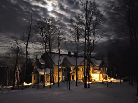 night view of condo building from the trail 