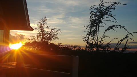 Enjoy the stunning sunsets from the top balcony. 