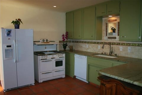 Granite top kitchen with restored Wedgewood Stove-really fun to cook with!