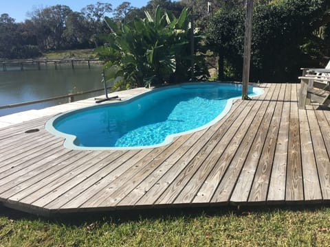 Floats and cushions for chairs nearby.