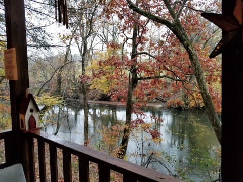 VERY private lower deck has hot tub & rockers and overlooks the lazy river below