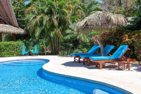Loungers by the pool and rancho