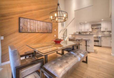 Kitchen open to the dining and living area; bar seating is great for breakfast.