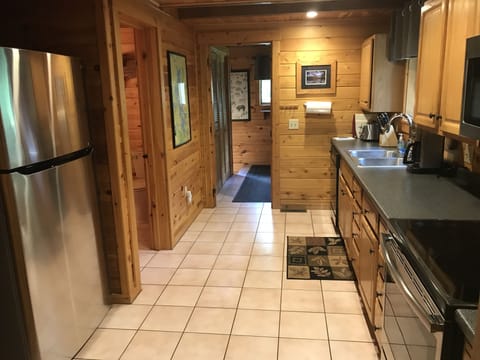 Kitchen looking towards the entrance and mudroom.