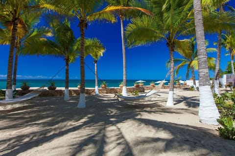 Exclusive beachfront Villa. Modern 5 bedroom house with private beach area.