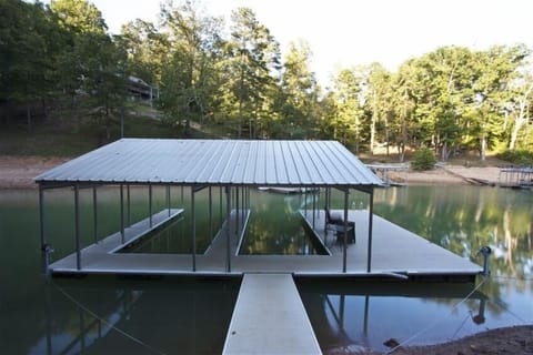 2 slip covered dock with 14 x 28 swim platform,  tie up for 2 extra boats