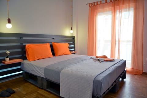 spacious bedroom with a king size bed