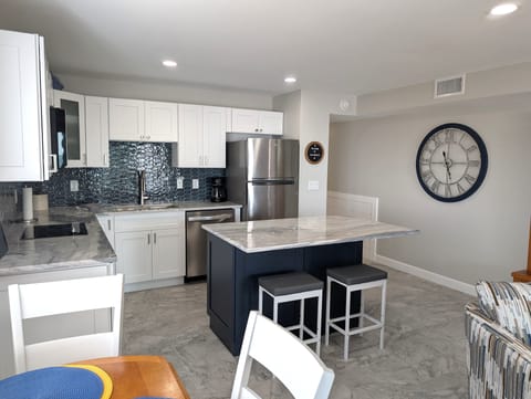 Large modern kitchen with island for an interactive kitchen experience