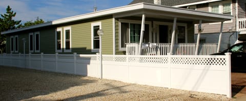 FRONT UNIT ON ONE LEVEL WITH FRONT PORCH, STEPS TO BEACH, PARKING FOR ONE CAR