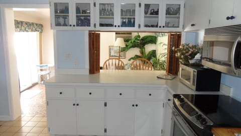 Eat at the bar, or the small table, (both pictured) or in the large dining room.