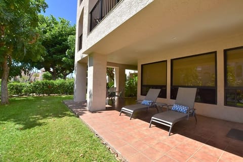 Oversized Lanai with plenty of seating located on the ground floor.