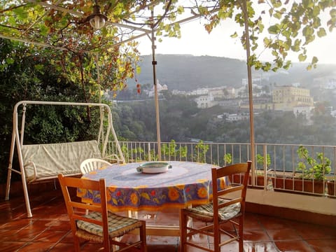 Panoramic terrace with rocking sofa