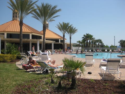 One of our pools, gym, club and pub on the background