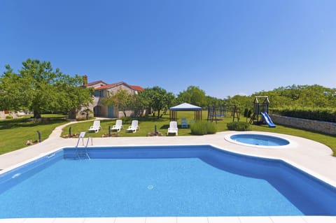 A large pool in the huge garden