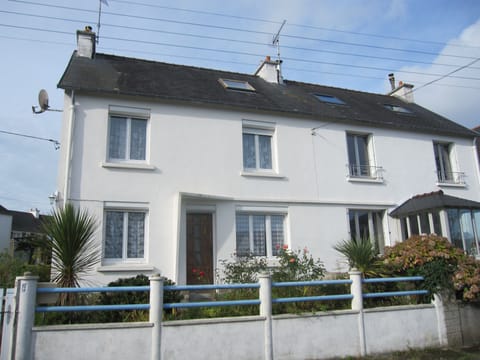 House on the right side (with bow window)