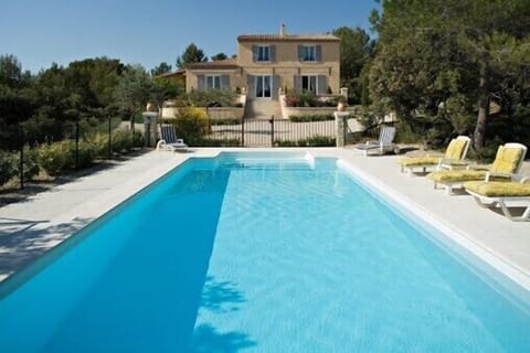 View of the pool from the South facade of the house