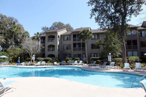 Large pool with lounge seating and hot tub!