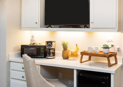 bedroom 2 entertainment area equipped with a full kitchenette and work area 