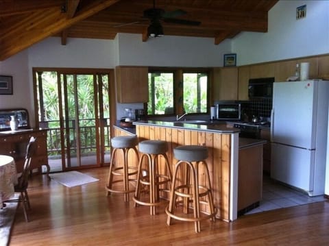 Kitchen area with bar-style seating